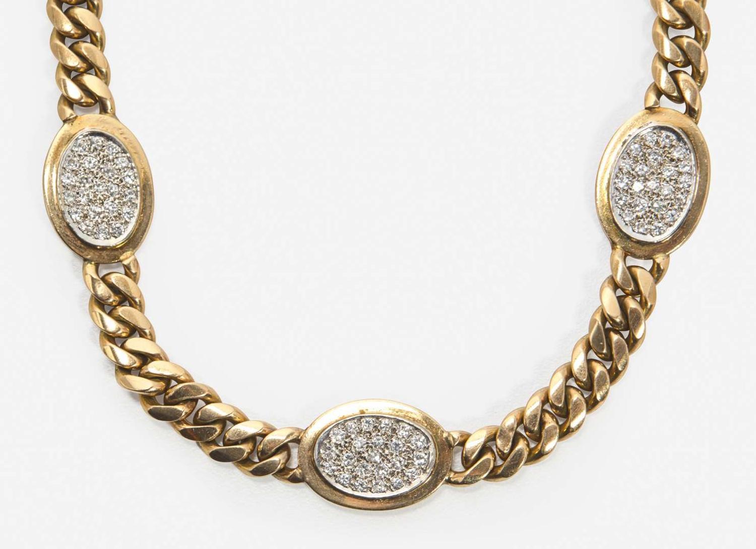 An 18K Yellow Gold Necklace with Diamond Stations