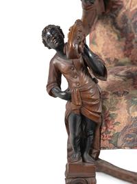 An Italian Baroque Style Carved Walnut Armchair