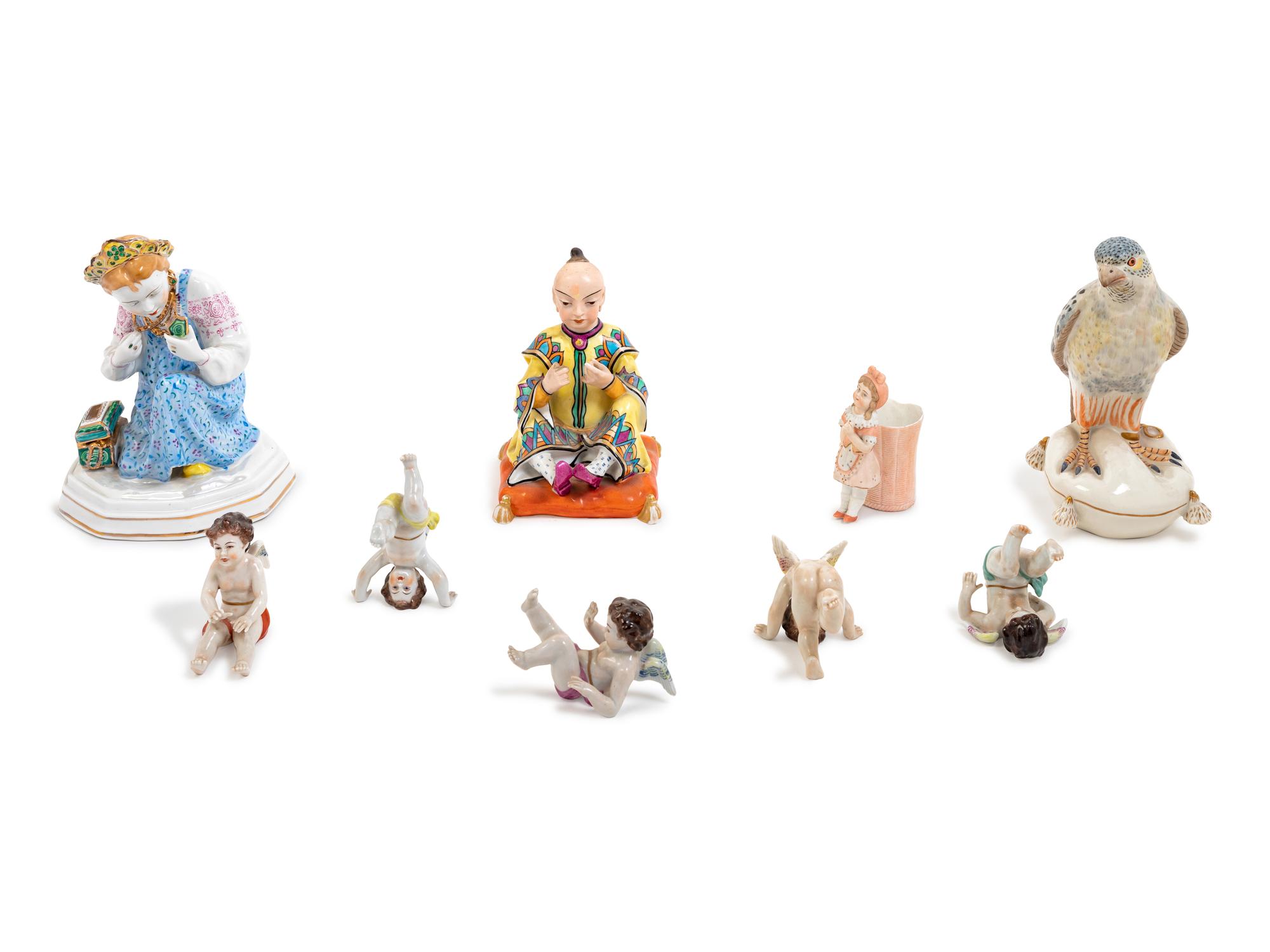Group of Nine Figural Porcelain Articles
