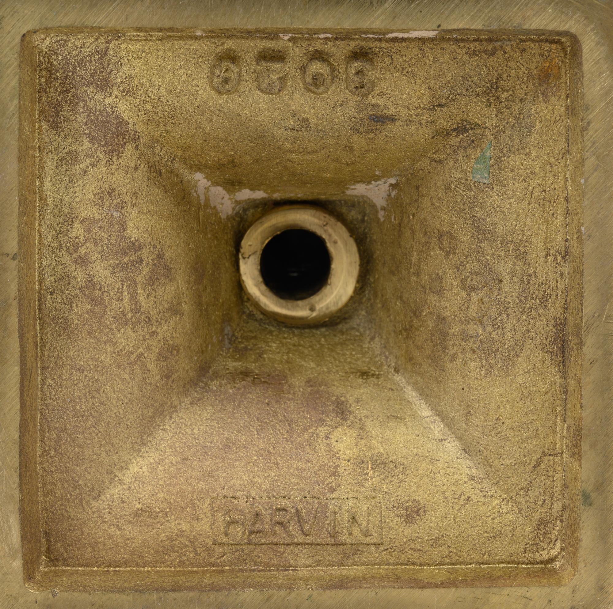 A Group of Brass Candlesticks
