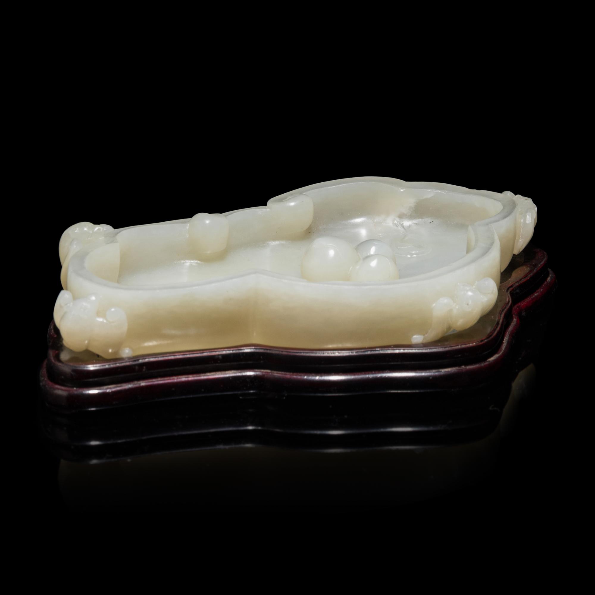 A Chinese White Jade 'Peach and Bat' Washer 白玉云蝠壽桃紋筆洗