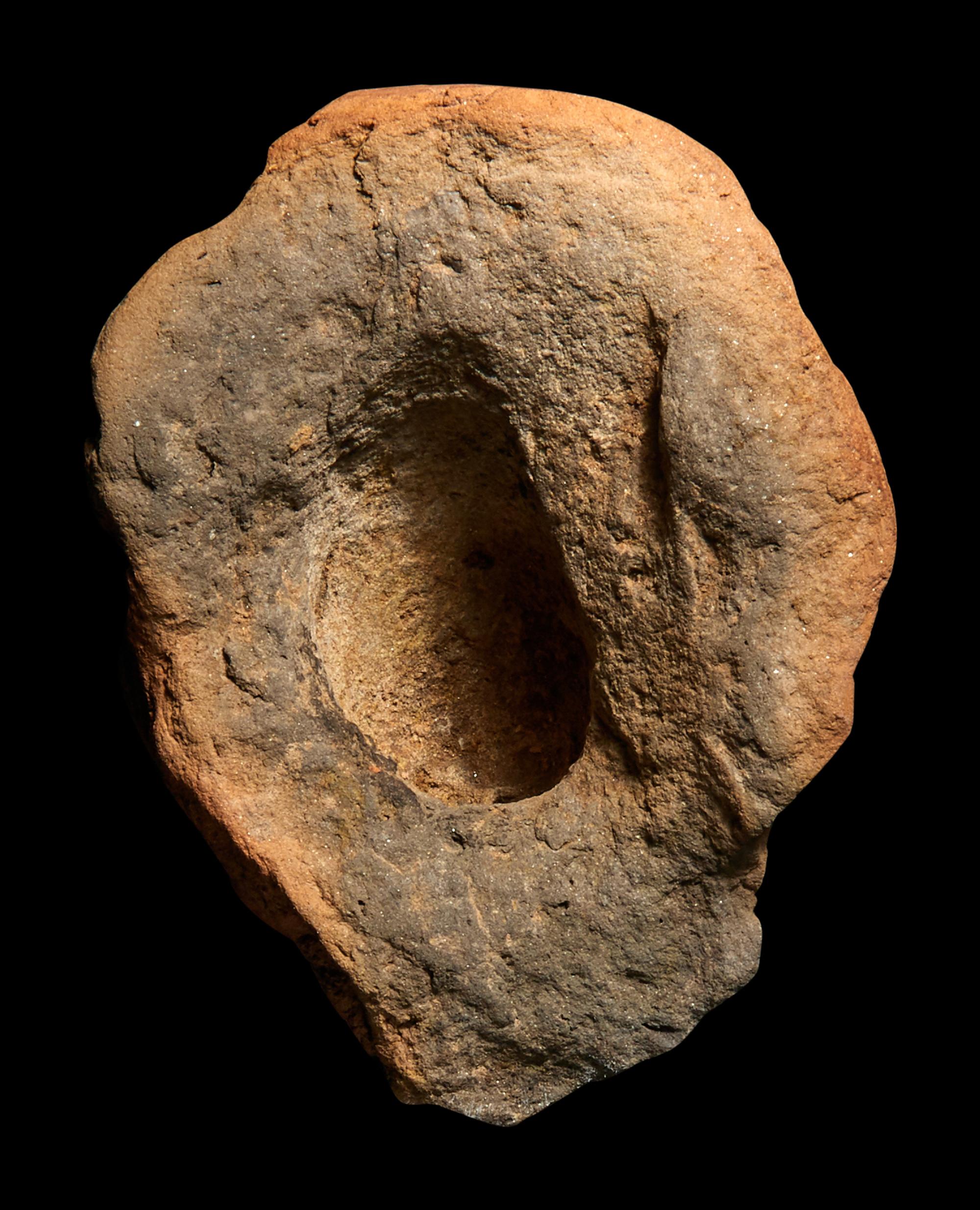 A Roman Terracotta Grotesque Head