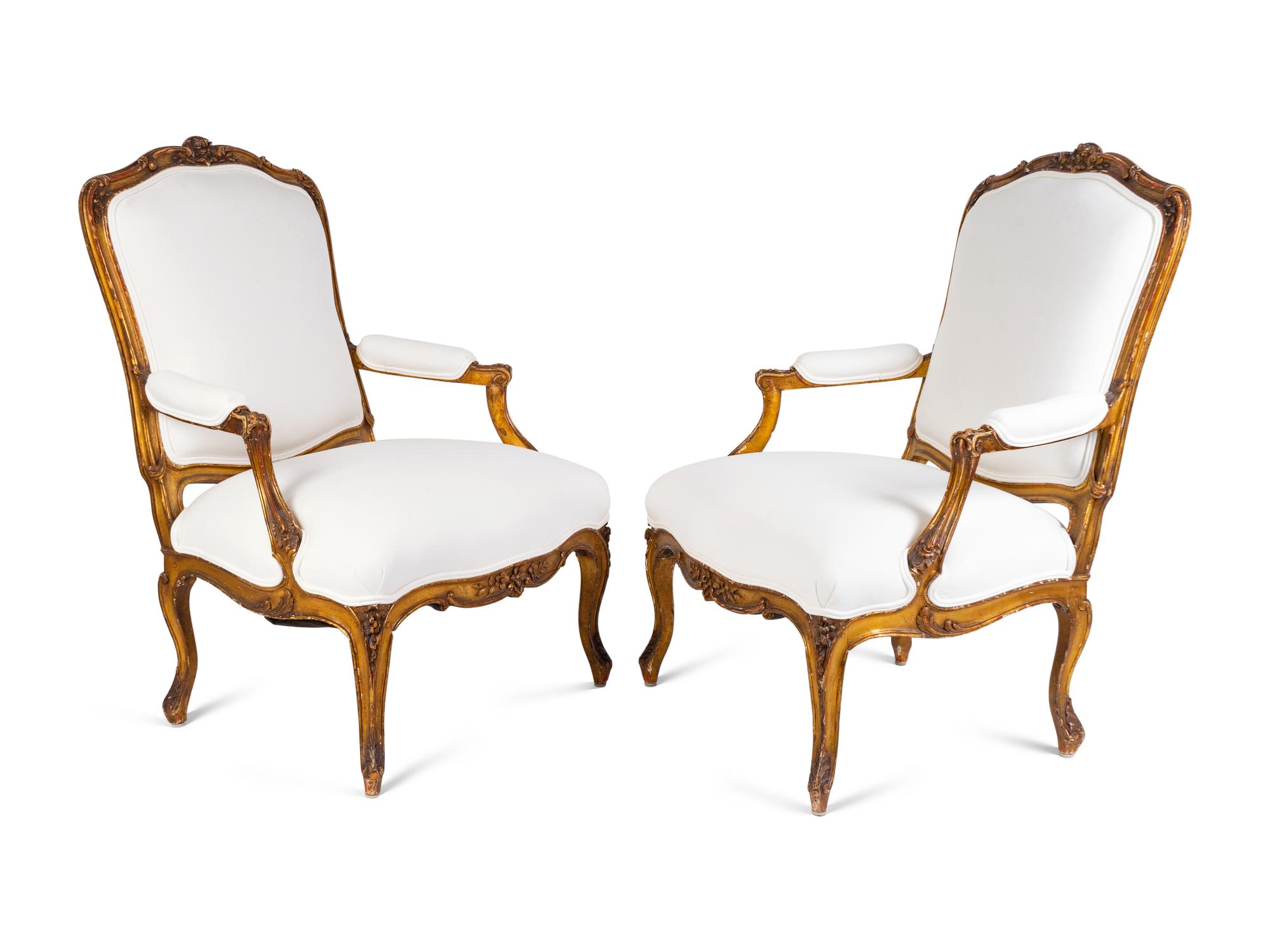 A Pair of Louis XV Giltwood Bergeres — LATE 18TH CENTURY