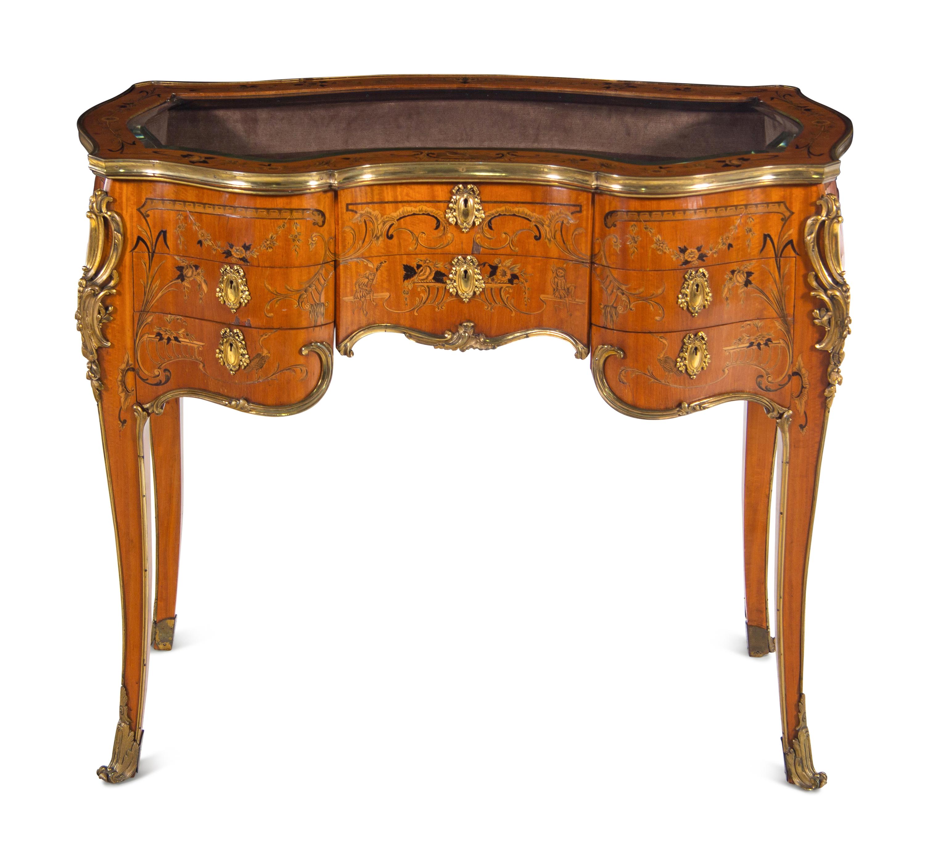 A Louis XV Style Gilt Bronze Mounted Penwork and Marquetry Vitrine Commode