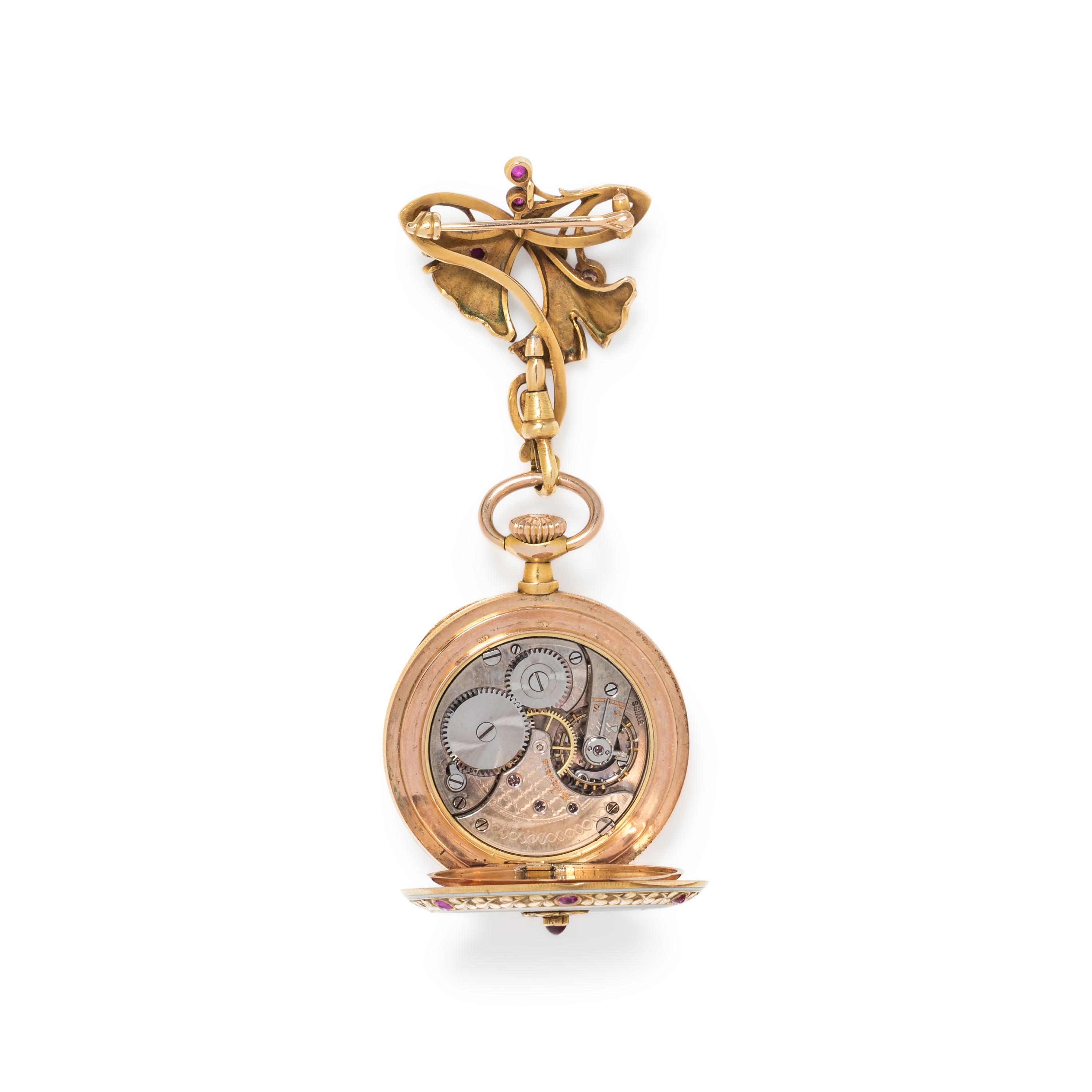 ART NOUVEAU, YELLOW GOLD, RUBY AND ENAMEL OPEN FACE LAPEL WATCH