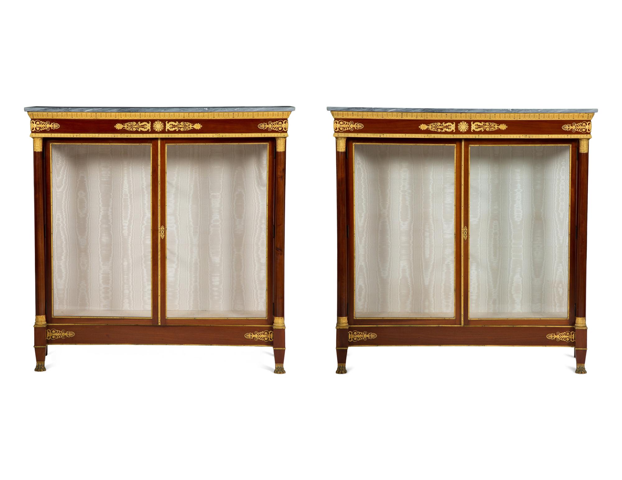 A Pair of Empire Style Gilt Bronze Mounted Mahogany Marble Top Vitrine Cabinets