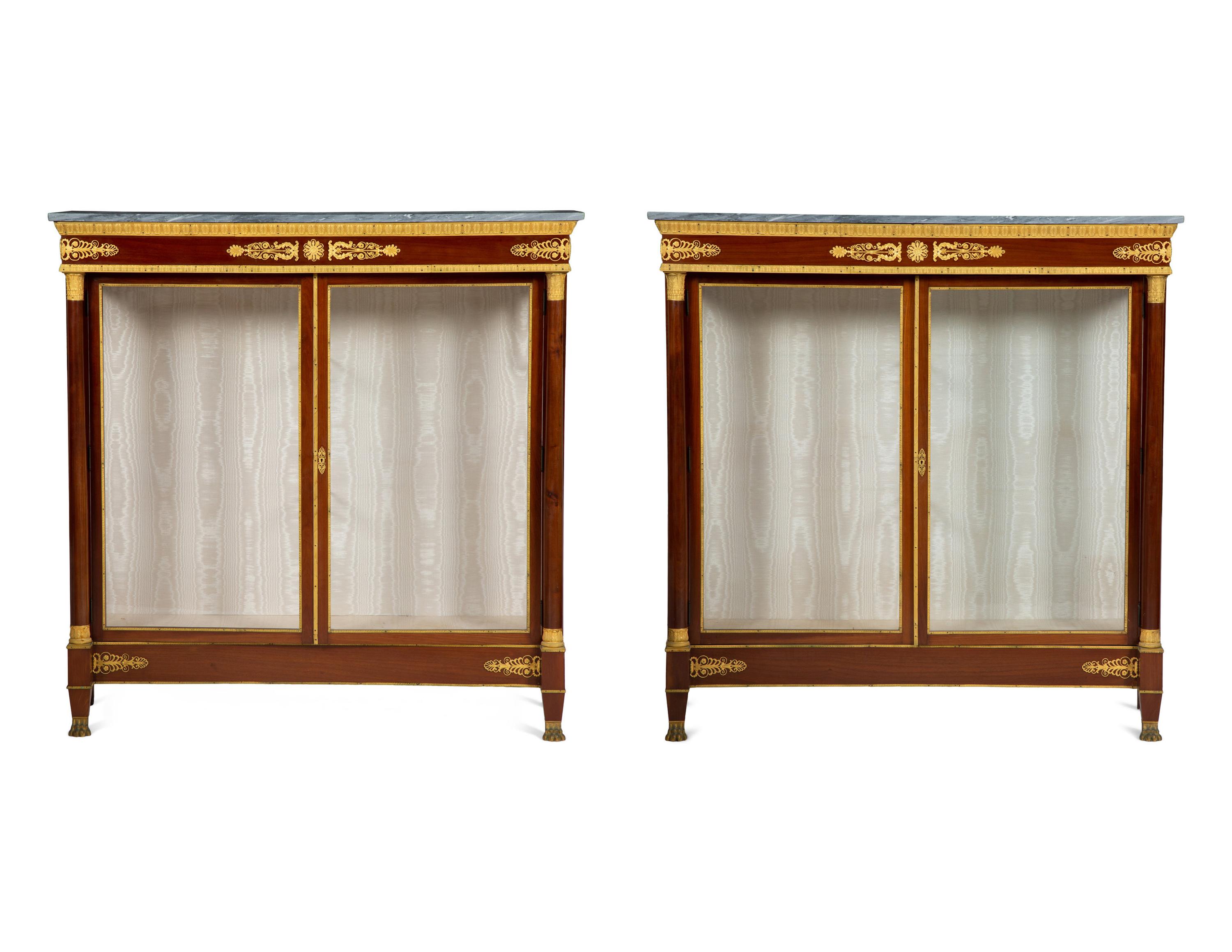 A Pair of Empire Style Gilt Bronze Mounted Mahogany Marble Top Vitrine Cabinets