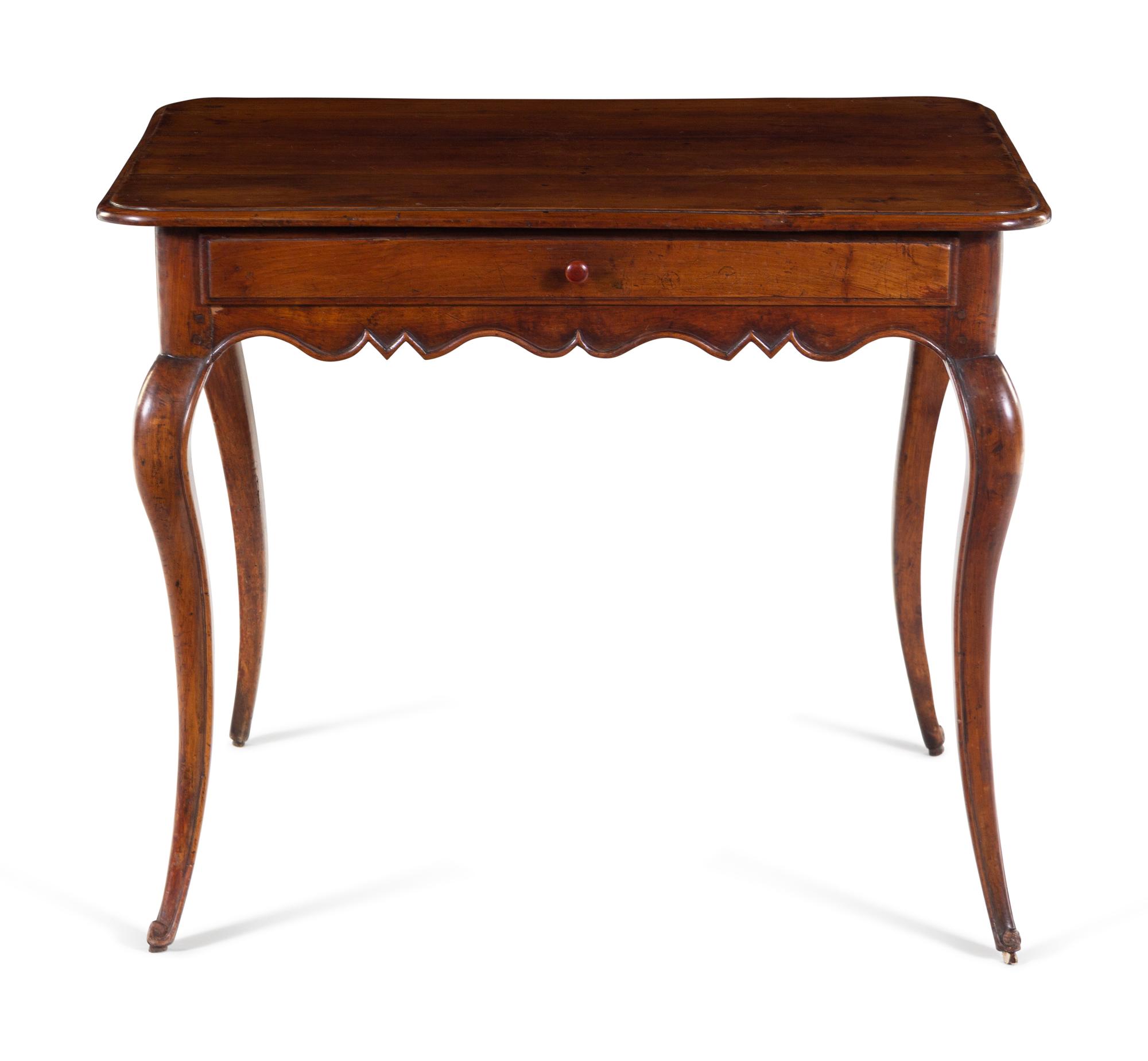A French Provincial Walnut Table