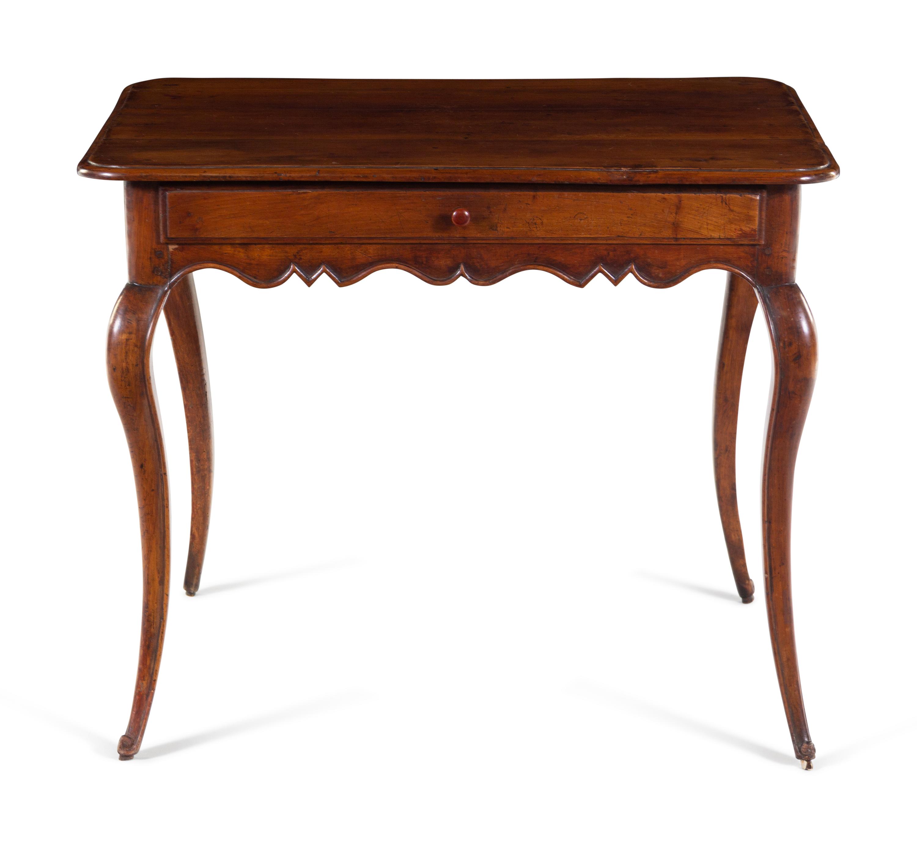 A French Provincial Walnut Table