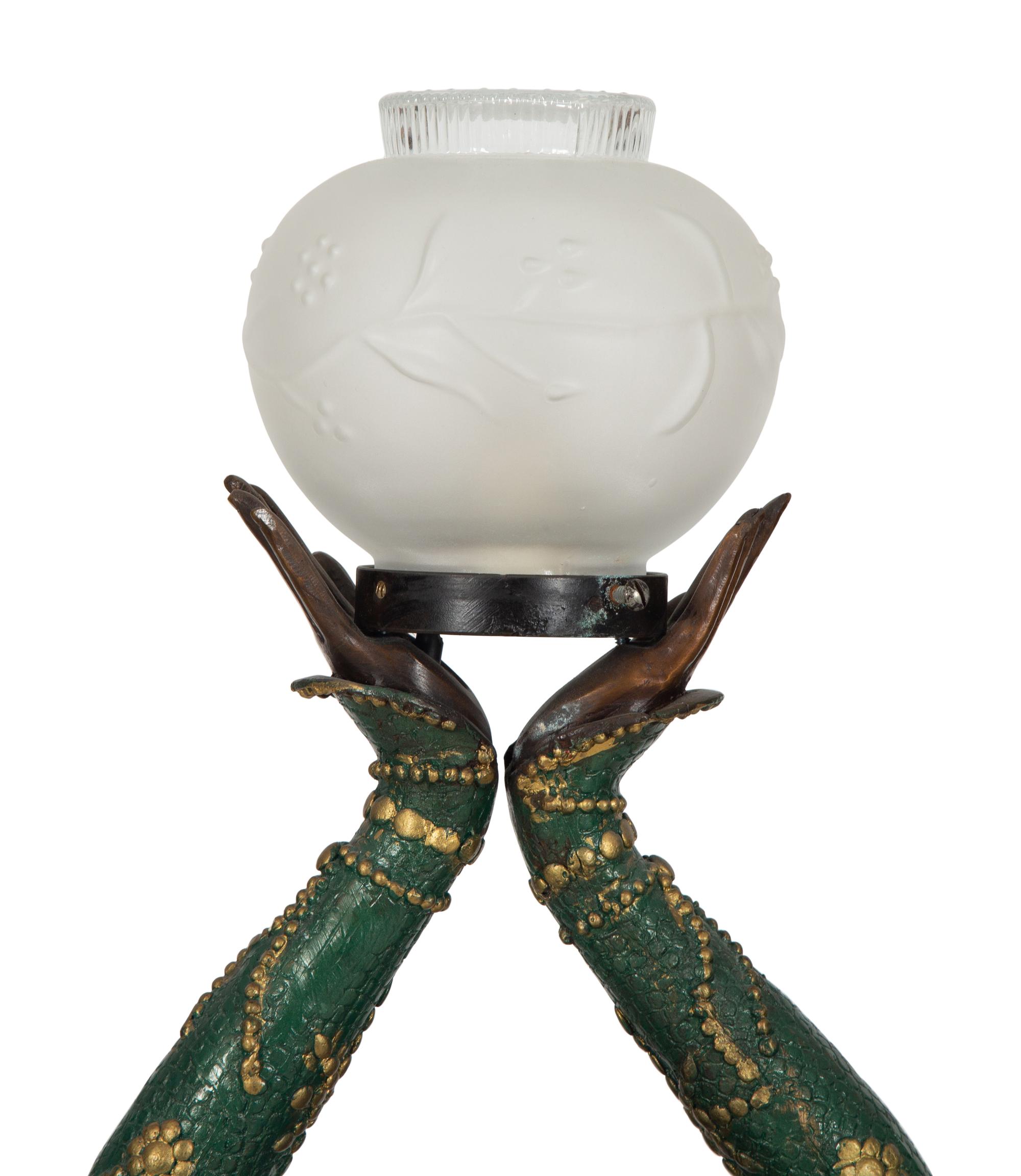 A Polychromed Metal Figural Floor Lamp in the Style of Chiparus