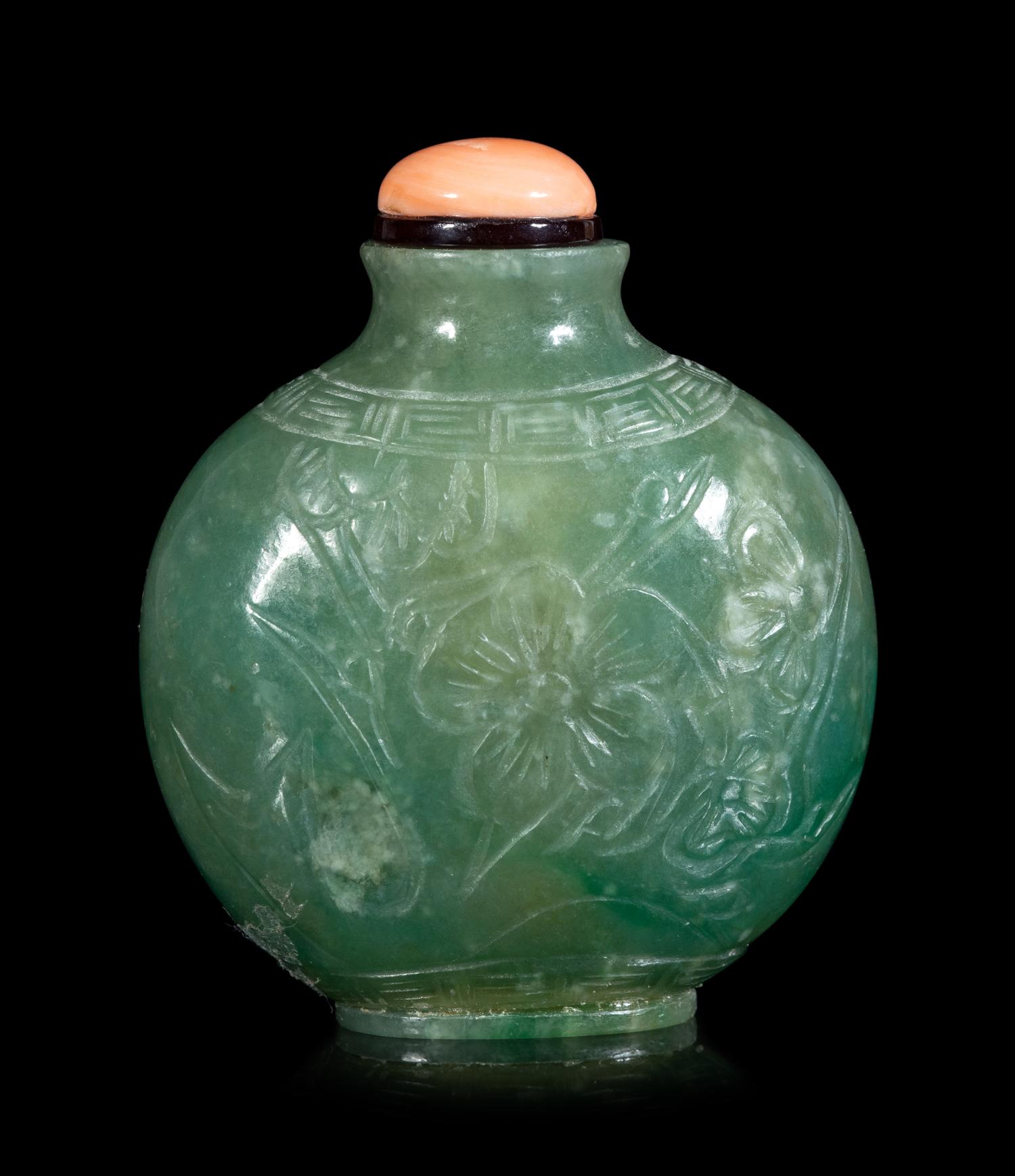 A Chinese Carved Jadeite Snuff Bottle