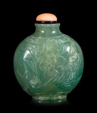 A Chinese Carved Jadeite Snuff Bottle