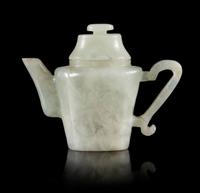 A Small Jadeite Teapot Height 3 inches.