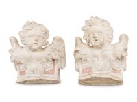A Pair of Italian Carved Marble Figural Corbel Capitals