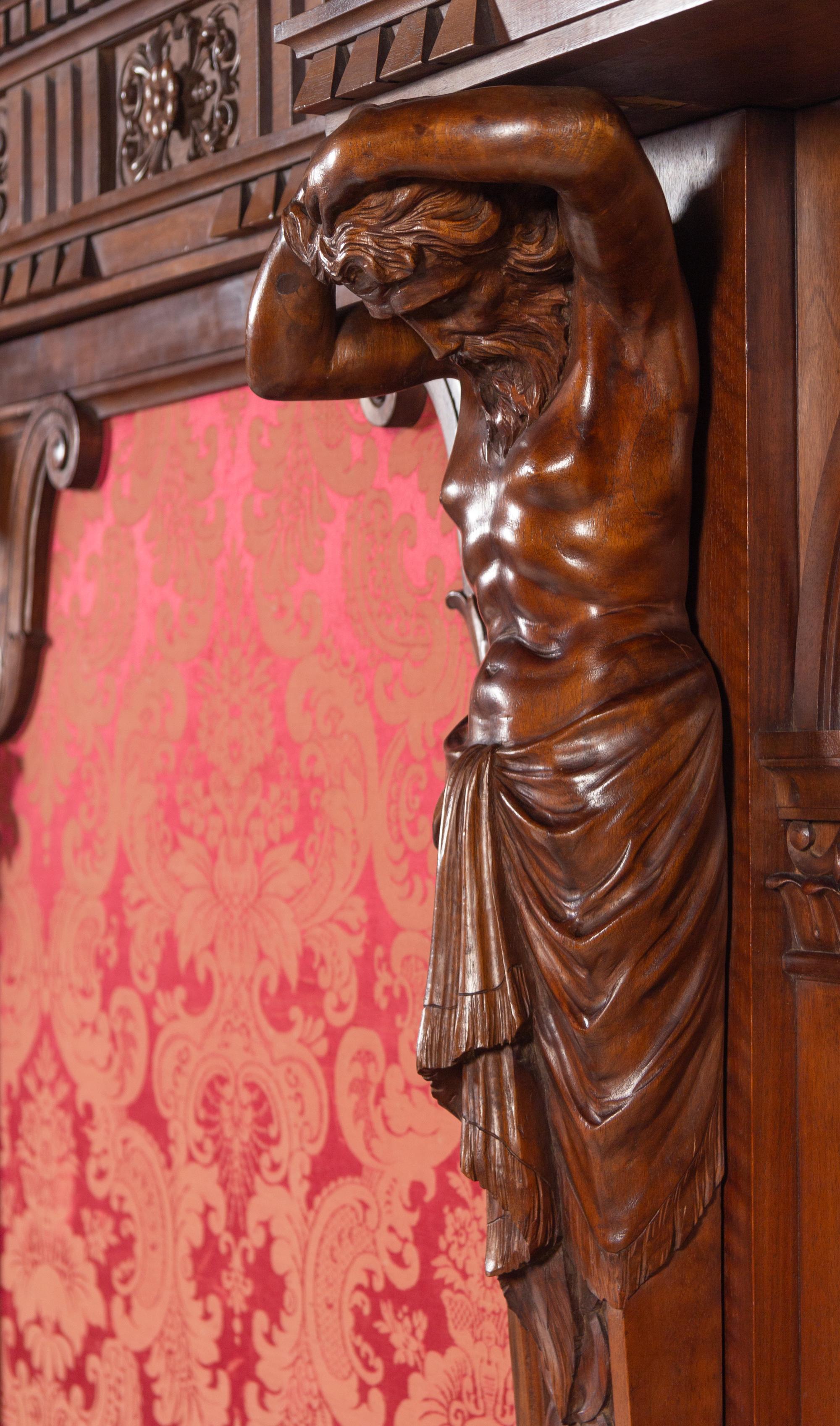 A Renaissance Revival Style Carved Walnut and Marquetry Hall Bench