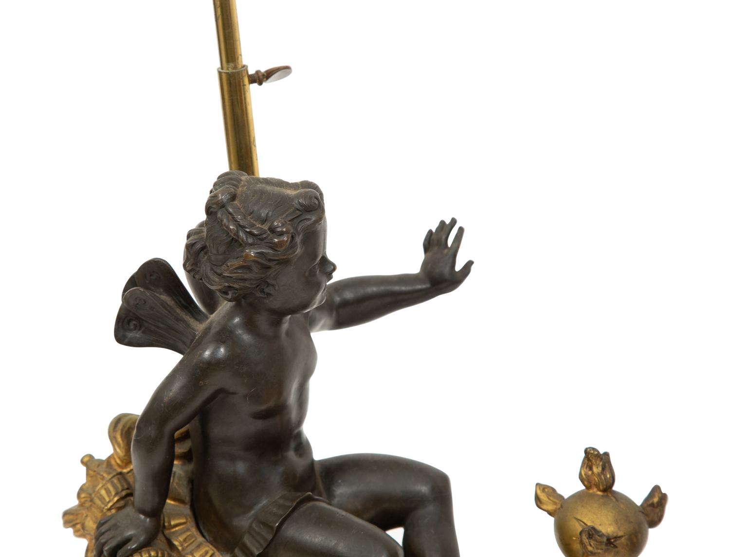A Pair of French Gilt and Patinated Bronze Figural Chenets Mounted as Lamps