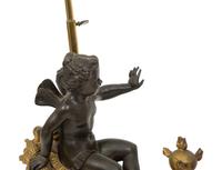 A Pair of French Gilt and Patinated Bronze Figural Chenets Mounted as Lamps
