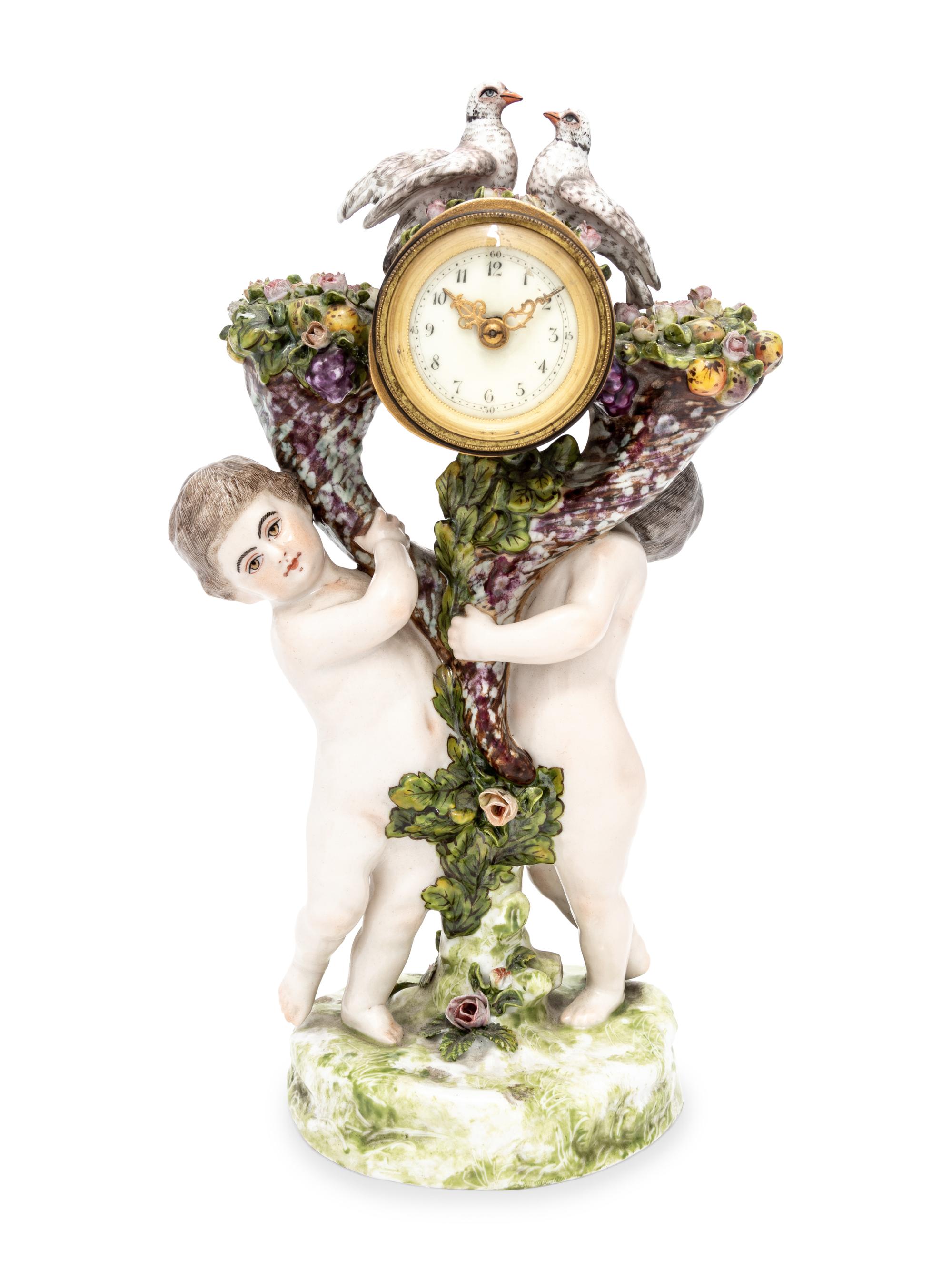 A Continental Figural Porcelain Clock
