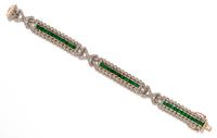 A 14 Karat Bicolor Gold, Emerald and Diamond Bracelet, 25.25 dwts.
