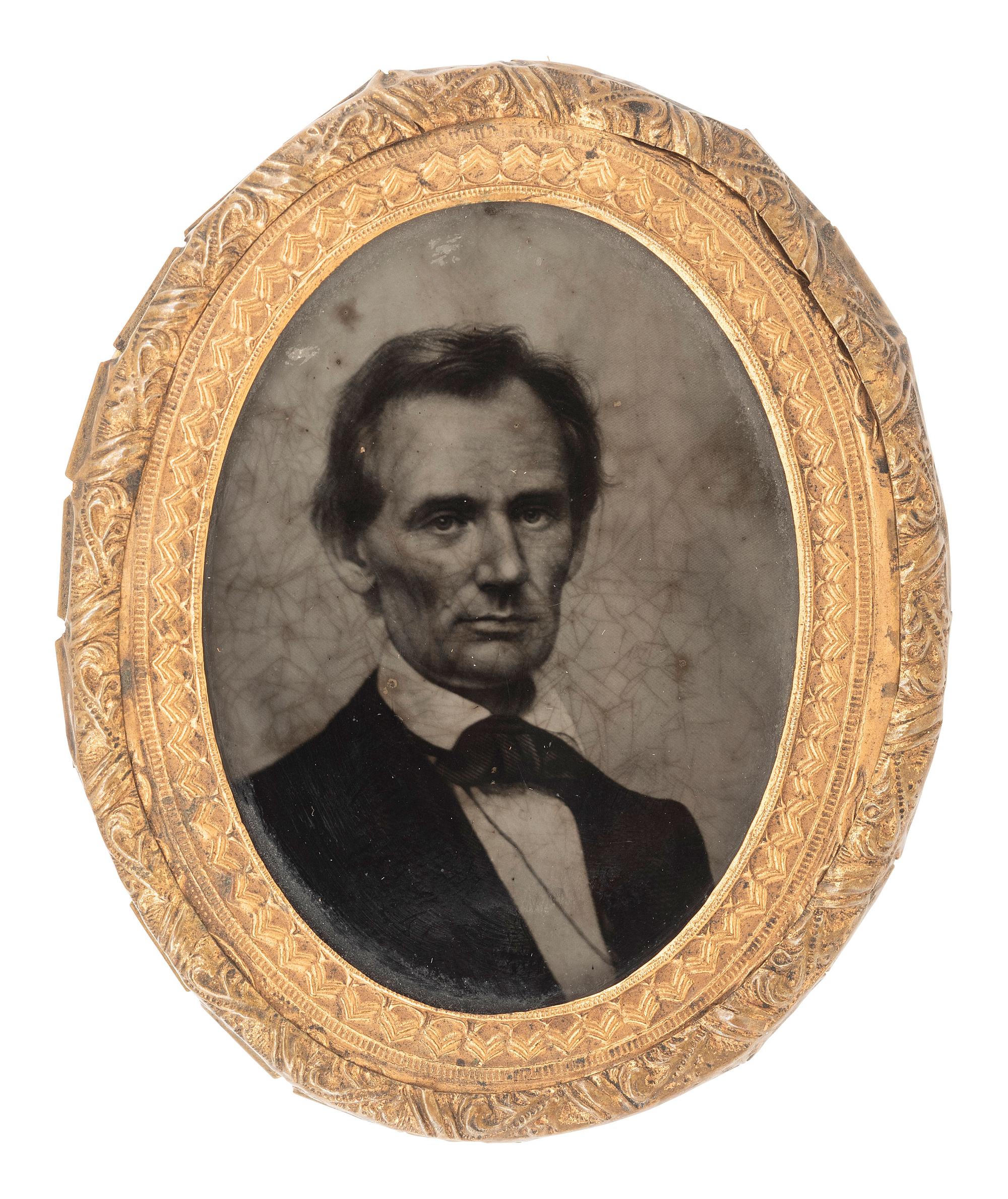 [LINCOLN, Abraham (1809-1865)]. Rare ambrotype brooch of Abraham Lincoln made by George Clark, Jr. for the 1860 campaign.