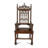An English Gothic Revival Carved Oak Armchair
