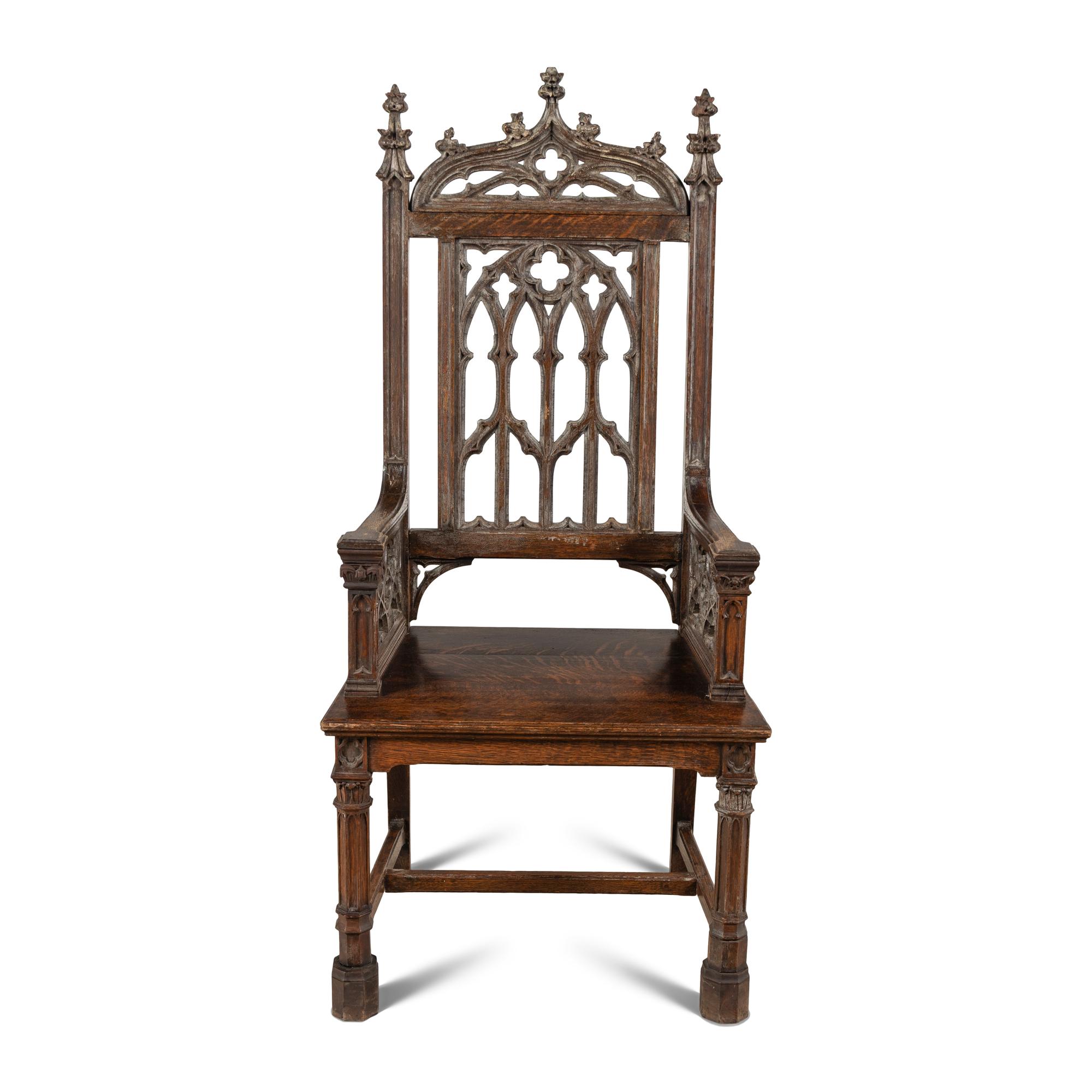 An English Gothic Revival Carved Oak Armchair