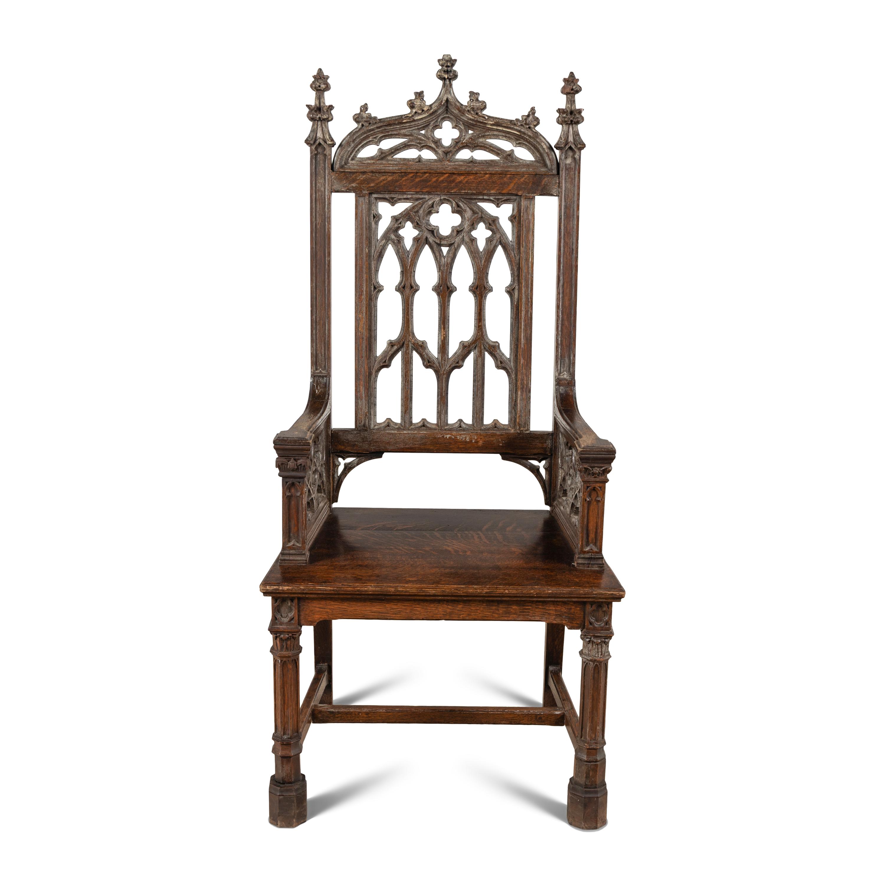 An English Gothic Revival Carved Oak Armchair