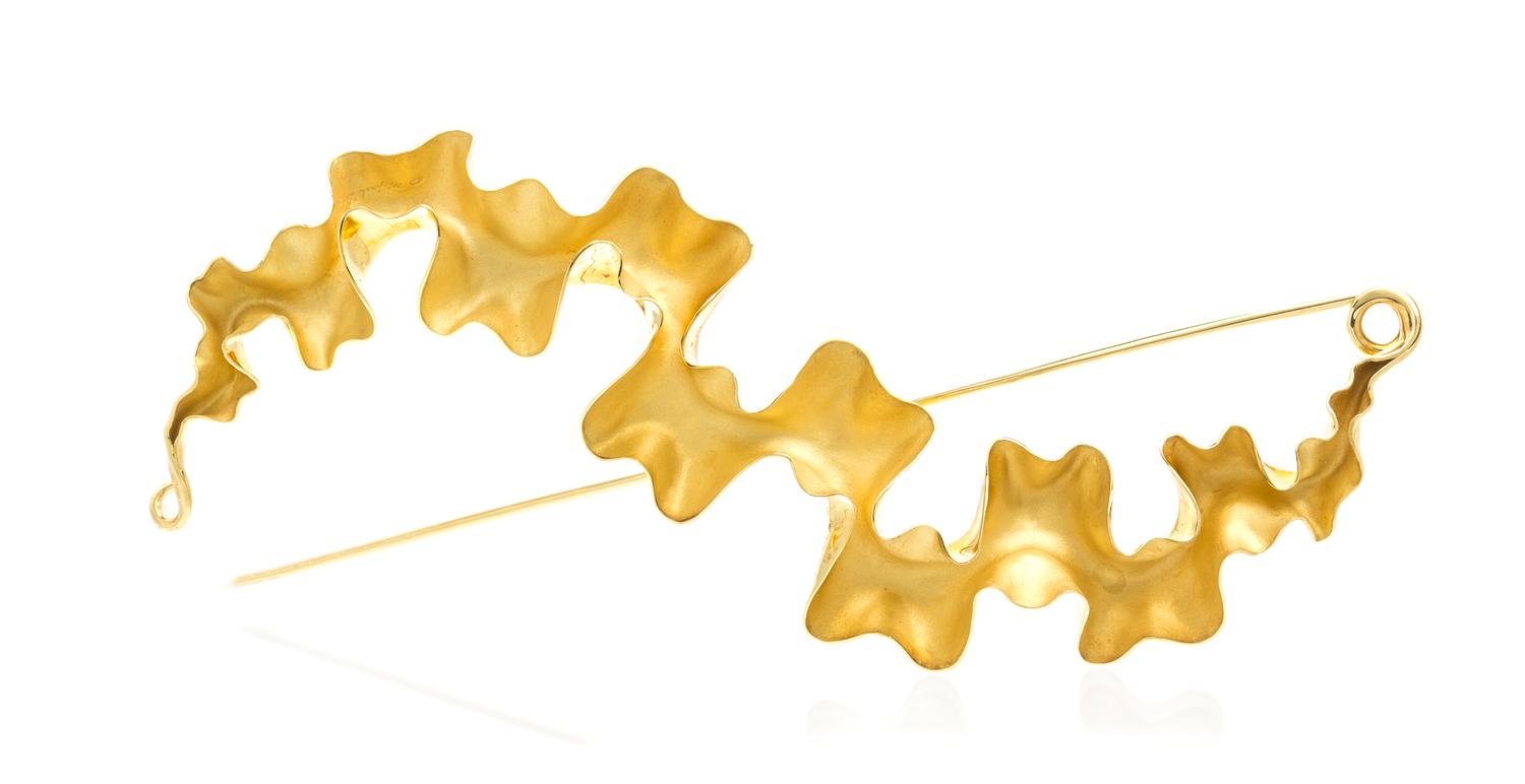 An 18 Karat Yellow Gold Lilliane Ruffle Pin, Michael Good, 10.10 dwts.