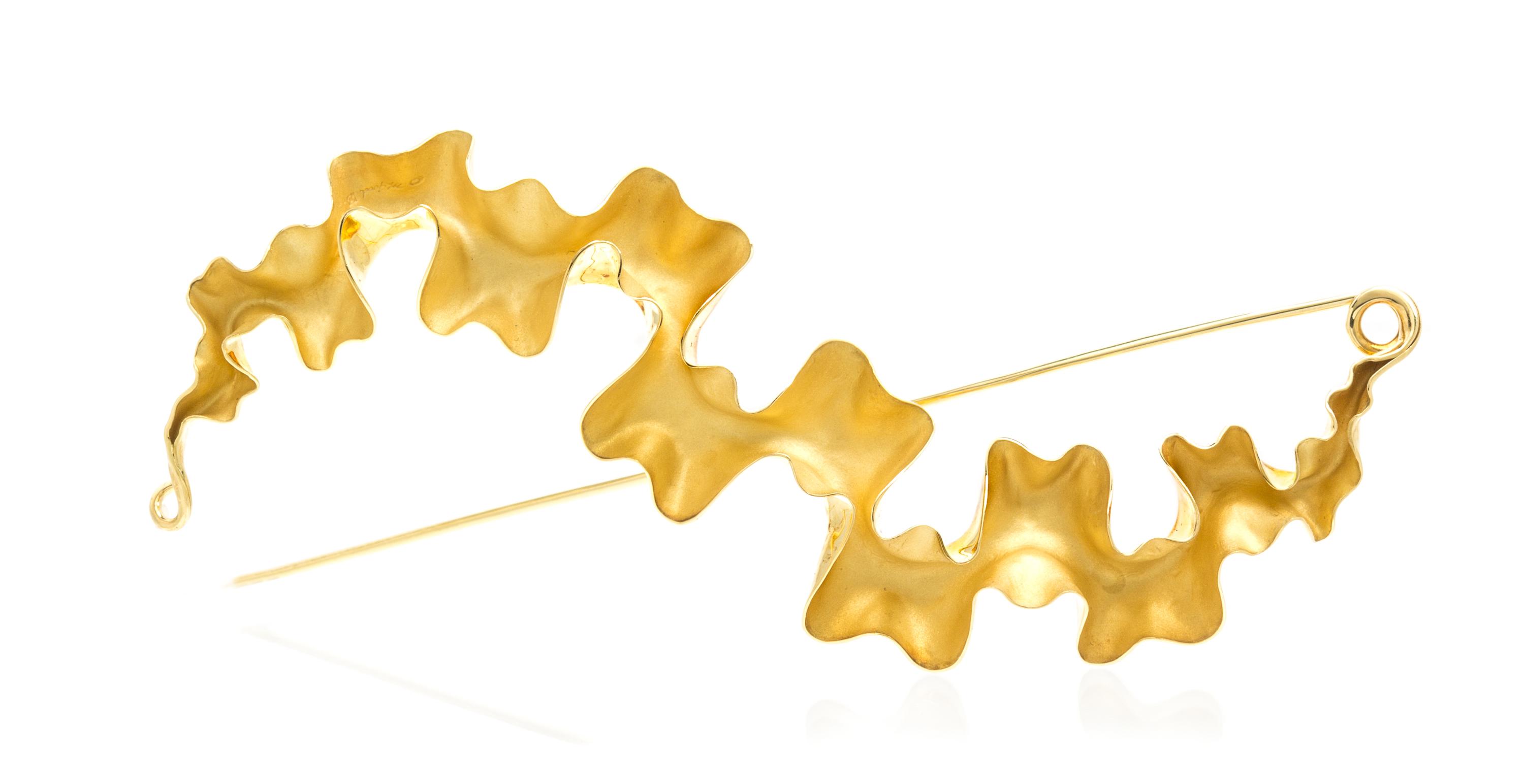 An 18 Karat Yellow Gold Lilliane Ruffle Pin, Michael Good, 10.10 dwts.