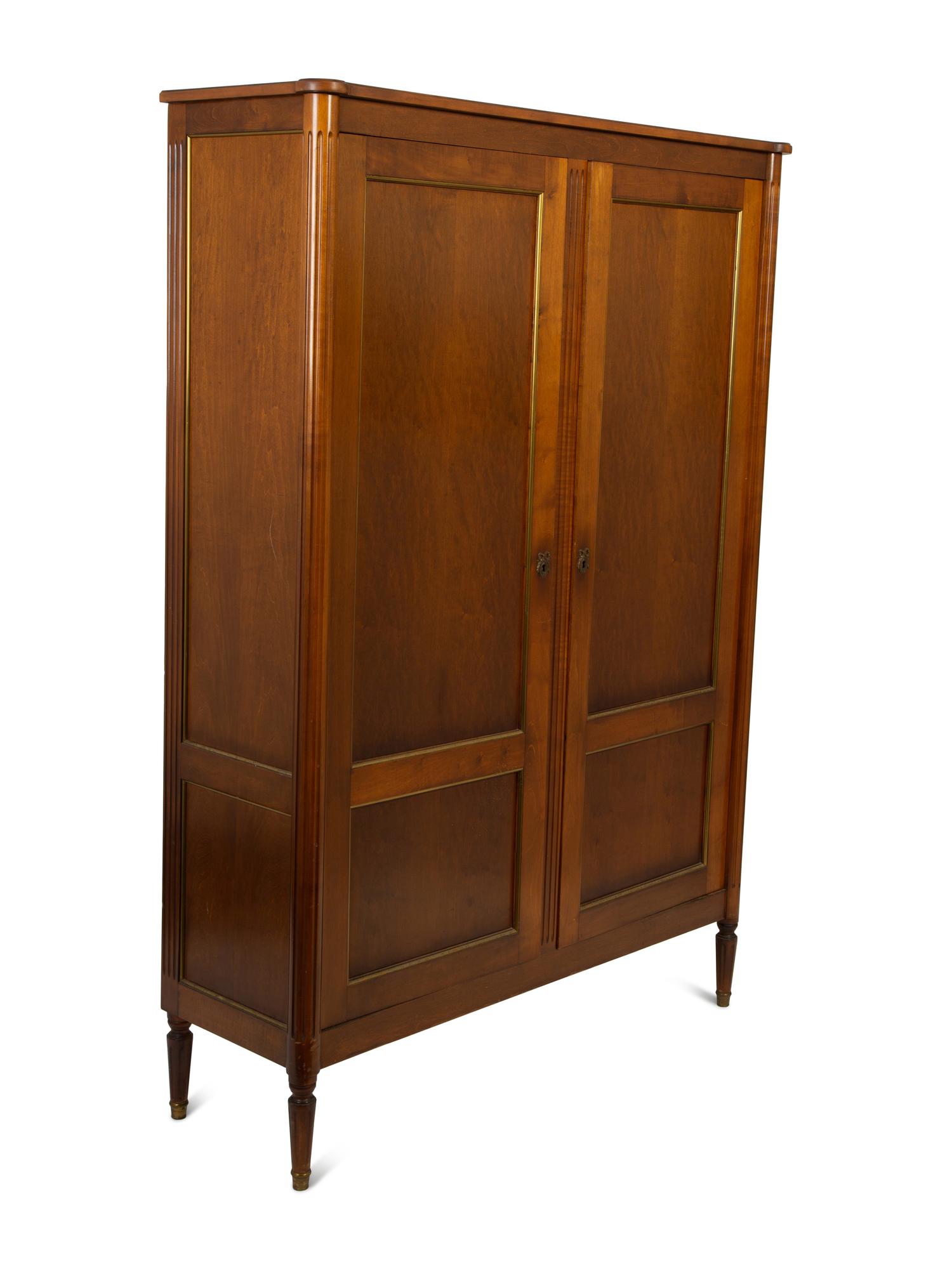A French Fruitwood Two Door Cabinet in the Manner of Maison Jansen — 20TH CENTURY