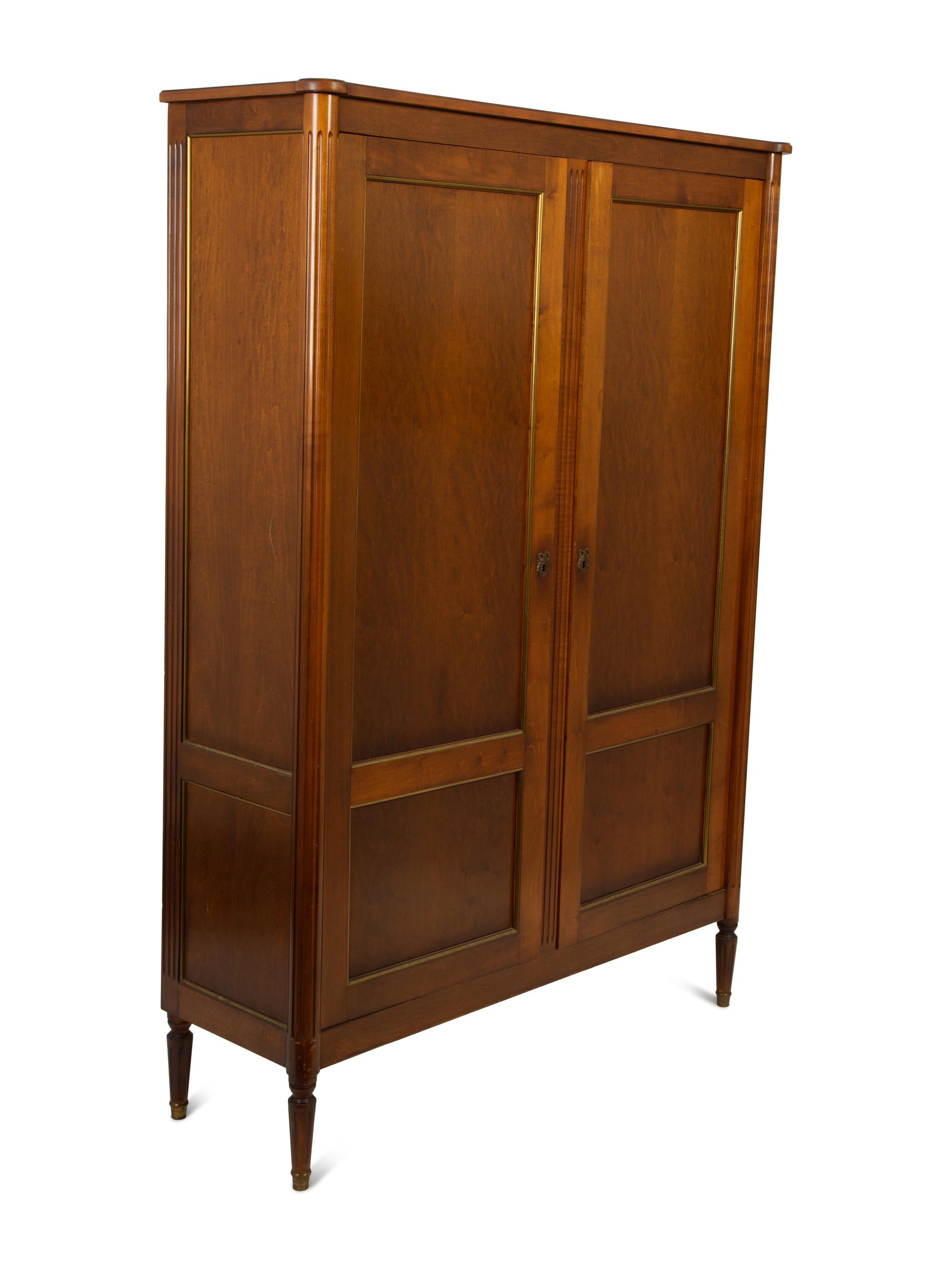 A French Fruitwood Two Door Cabinet in the Manner of Maison Jansen — 20TH CENTURY