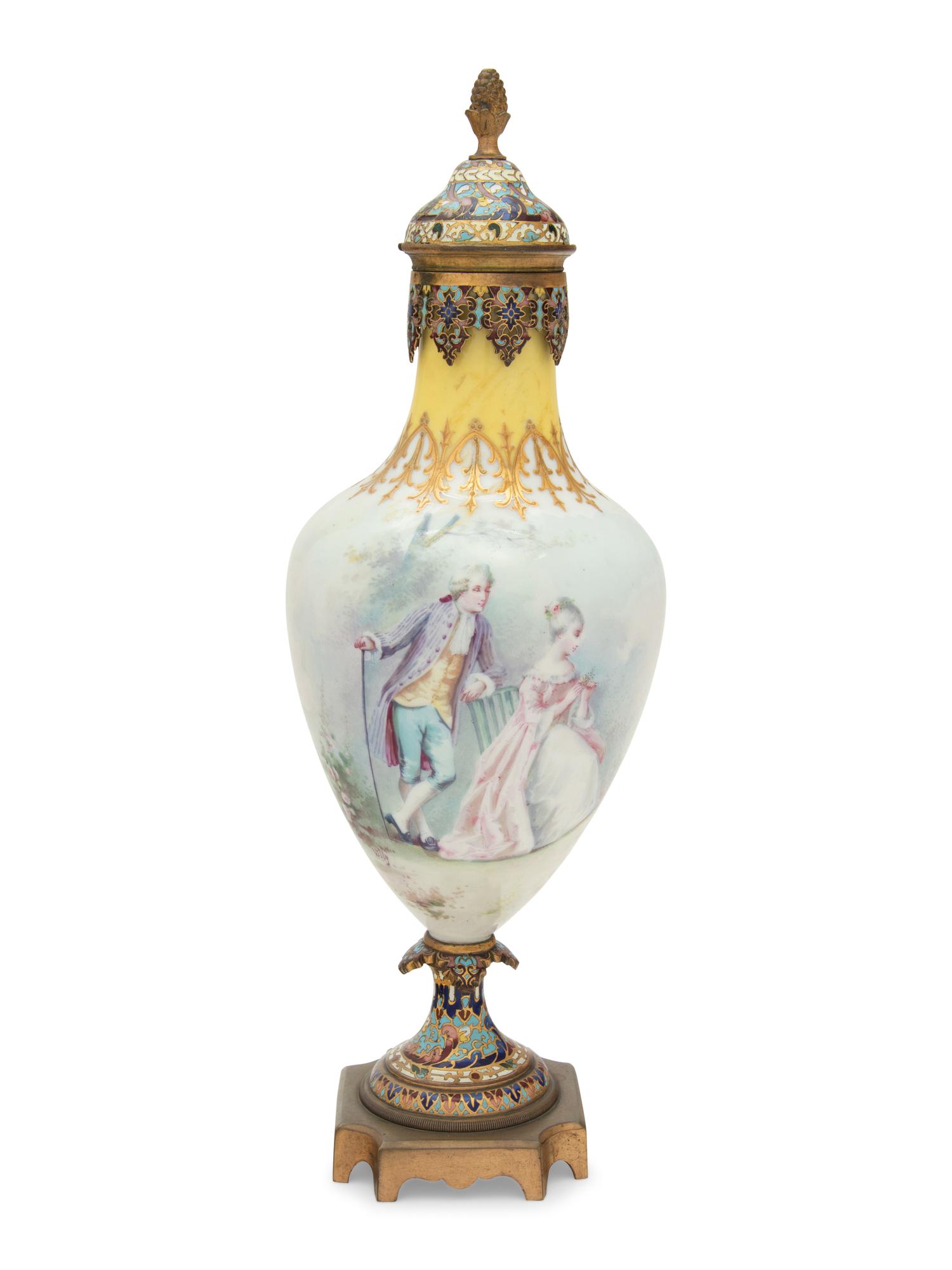 A Sèvres Style Gilt Bronze and Champlevé Enamel Mounted Porcelain Vase and Cover