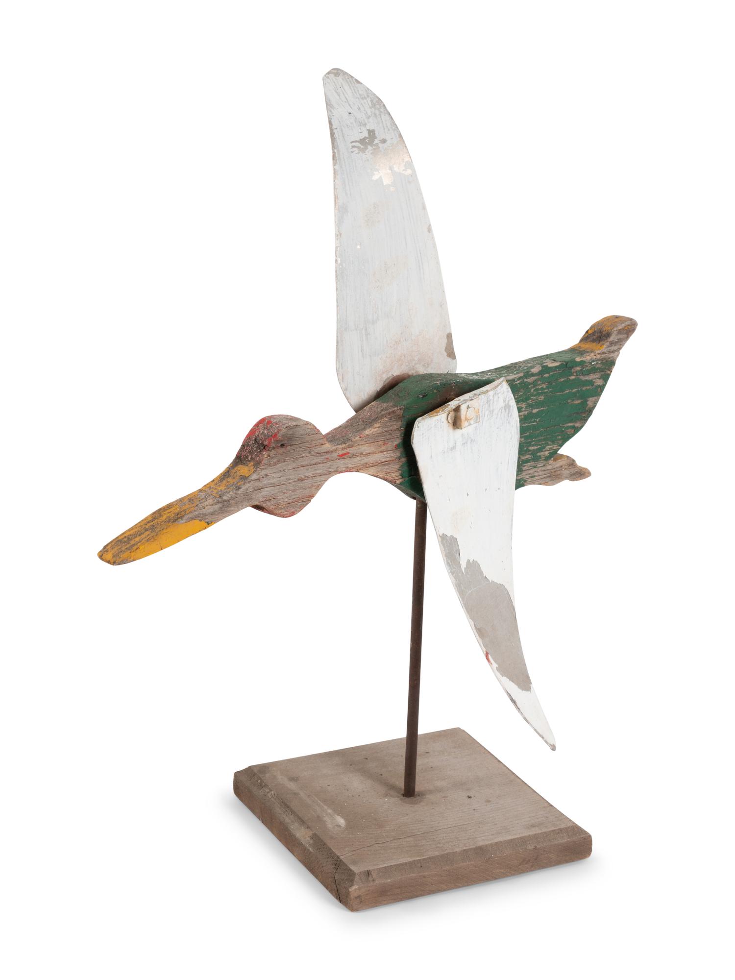 A Painted Tin and Carved Wood Duck Whirligig