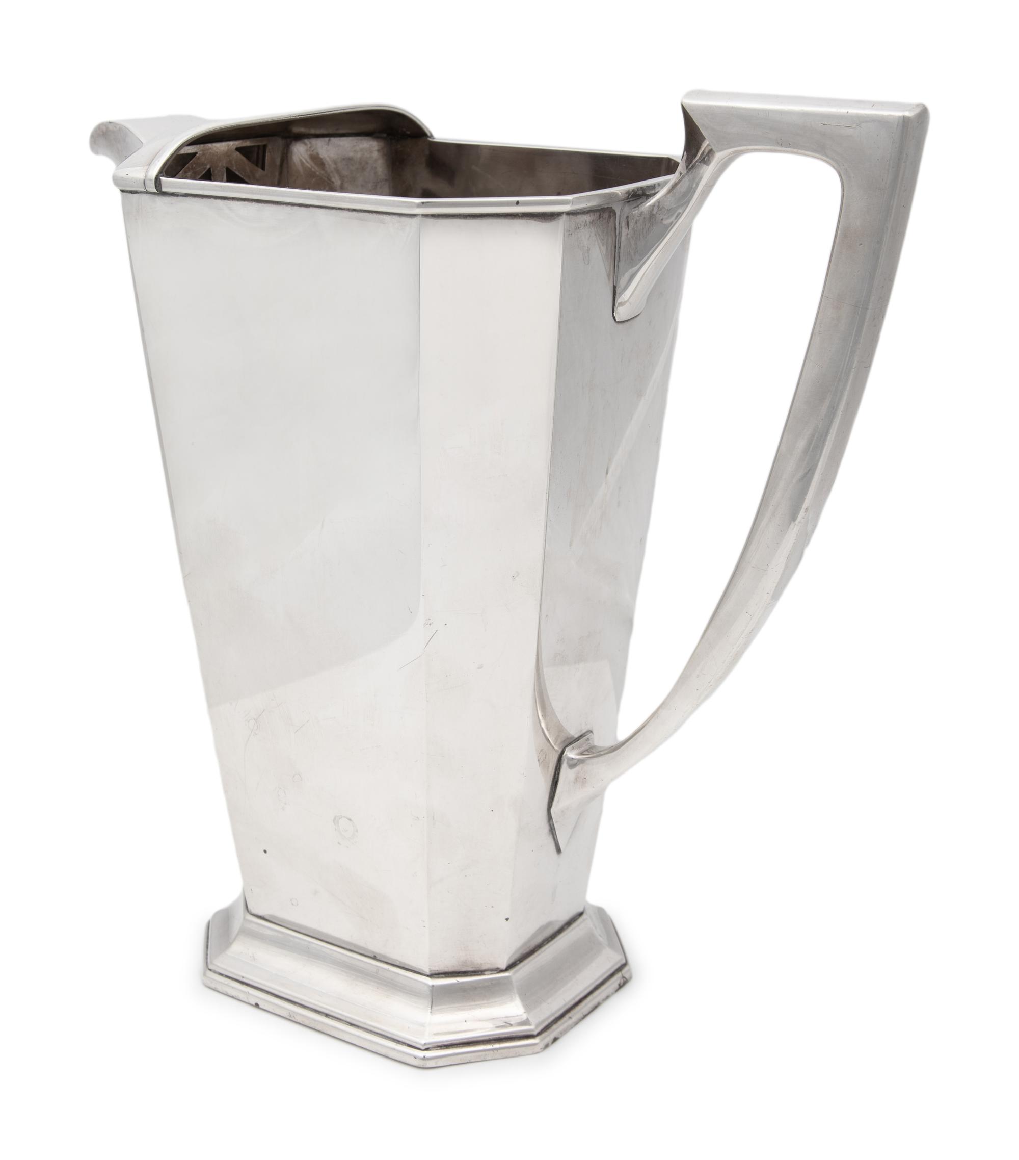 A Japanese Silver Water Pitcher