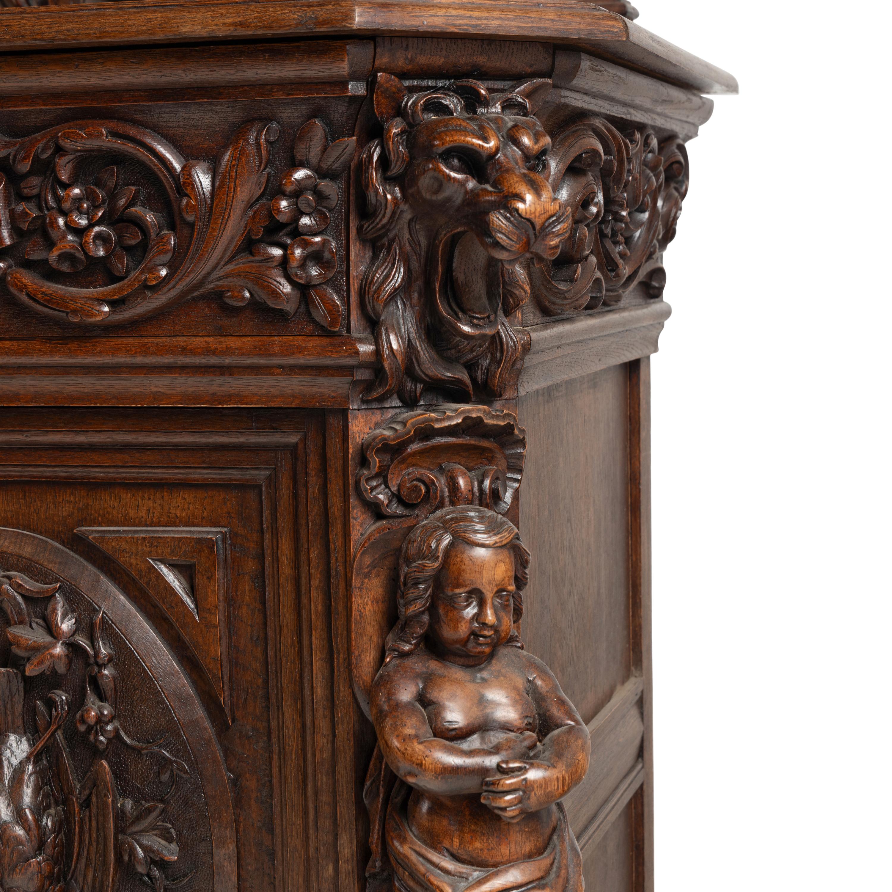 A French Carved Walnut Buffet à Deux Corps