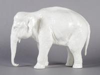 A Nymphenburg Porcelain Figure of an Elephant, Width 12 1/2 inches.