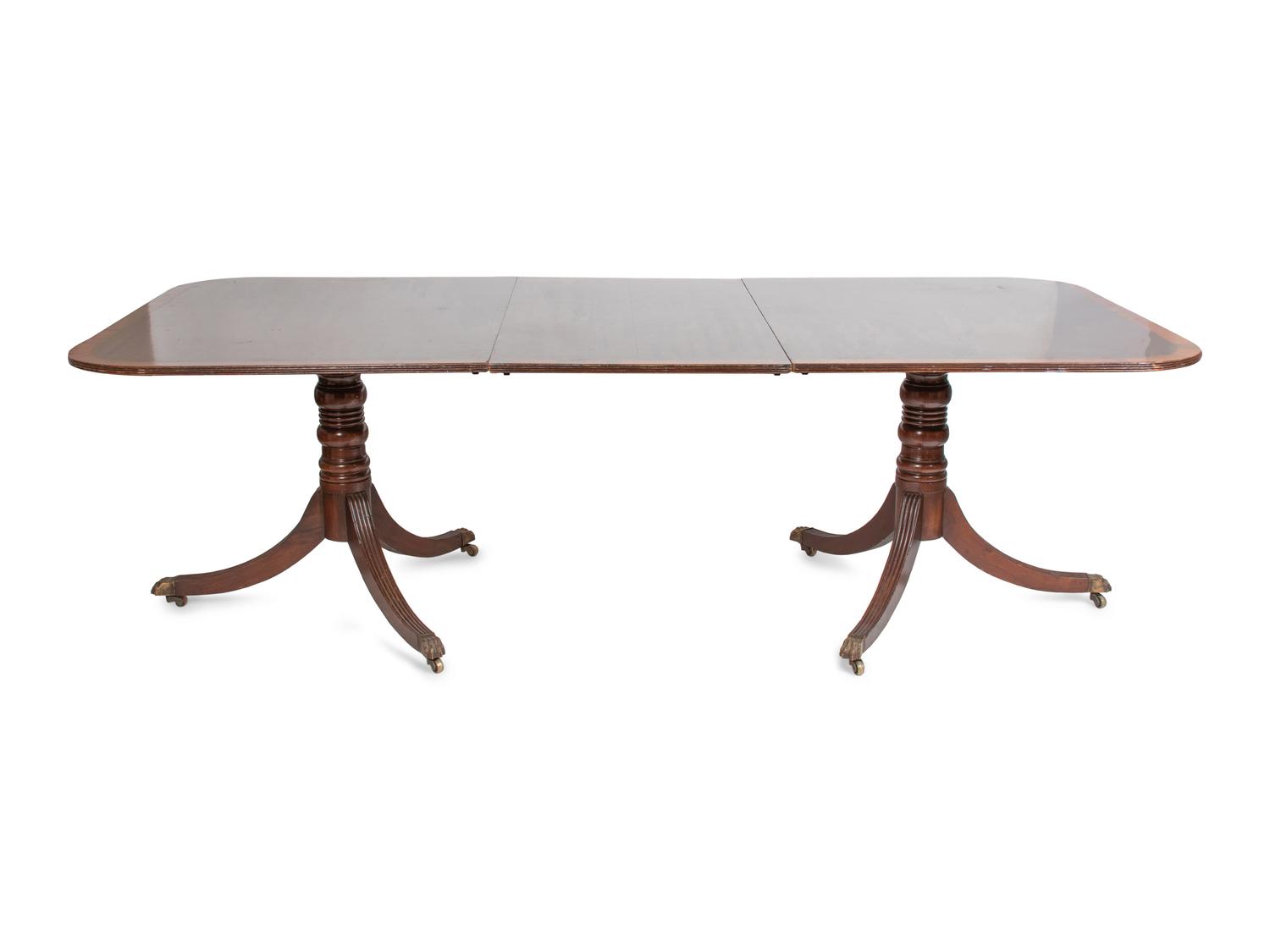A Regency Style Mahogany Double-Pedestal Dining Table