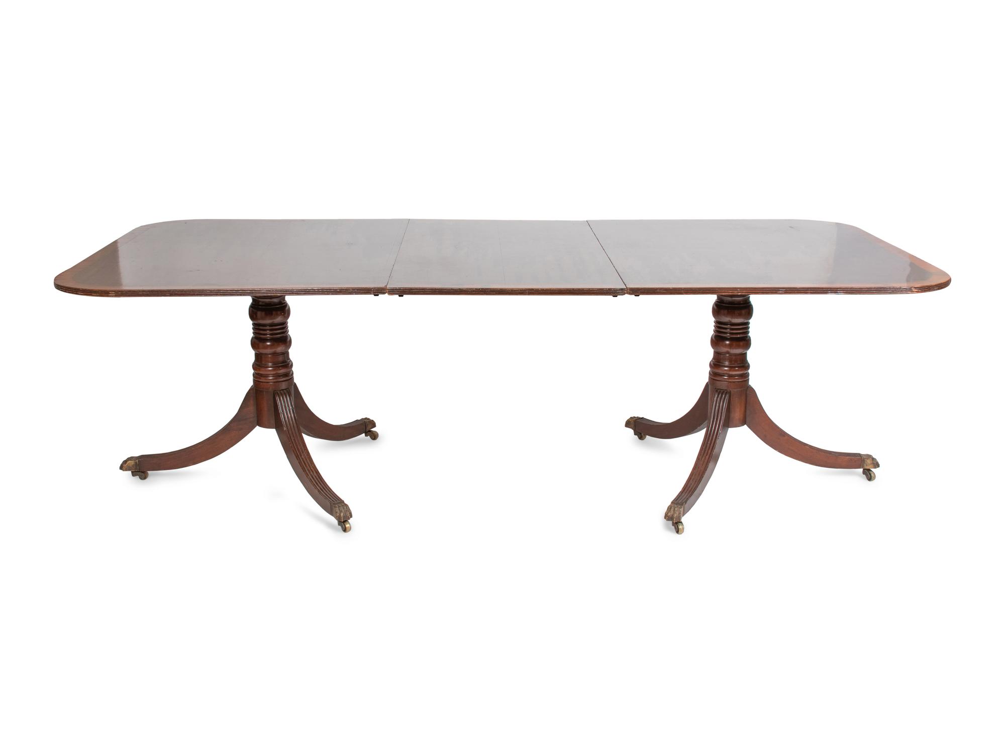 A Regency Style Mahogany Double-Pedestal Dining Table