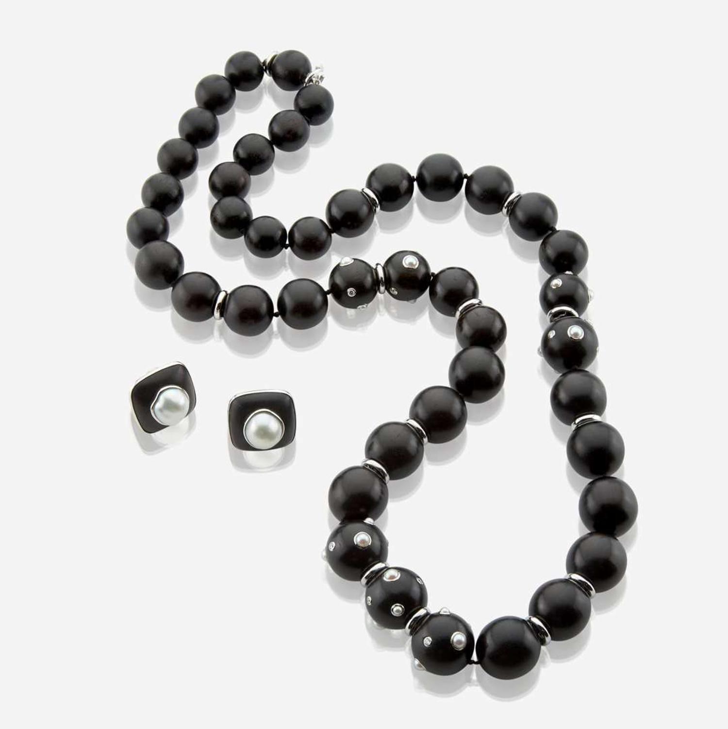 A white gold, ebony, diamond, and pearl necklace with matching earrings Trianon by Seaman Schepps