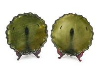 A Near Pair of Chinese Carved Spinach Jade Chargers