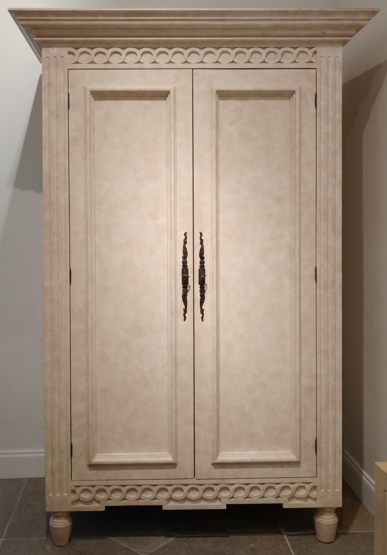 A Faux Stone Grained Wooden Armoire Height 82 x width 56 x depth 29 inches. — 20TH CENTURY