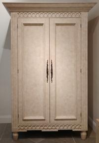 A Faux Stone Grained Wooden Armoire Height 82 x width 56 x depth 29 inches. — 20TH CENTURY