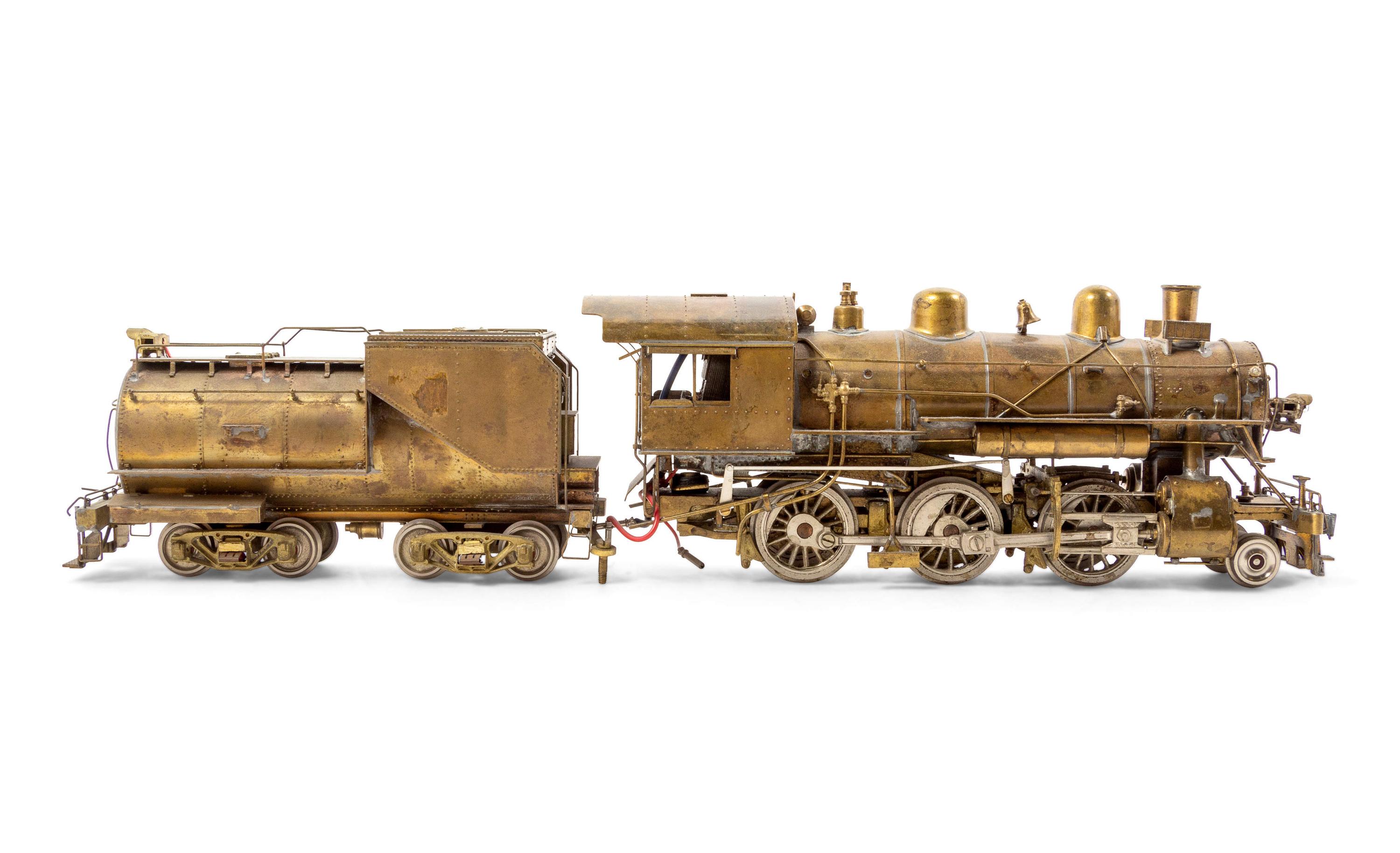 An MG Models Brass O-Gauge 2-6-0 Locomotive and Tender