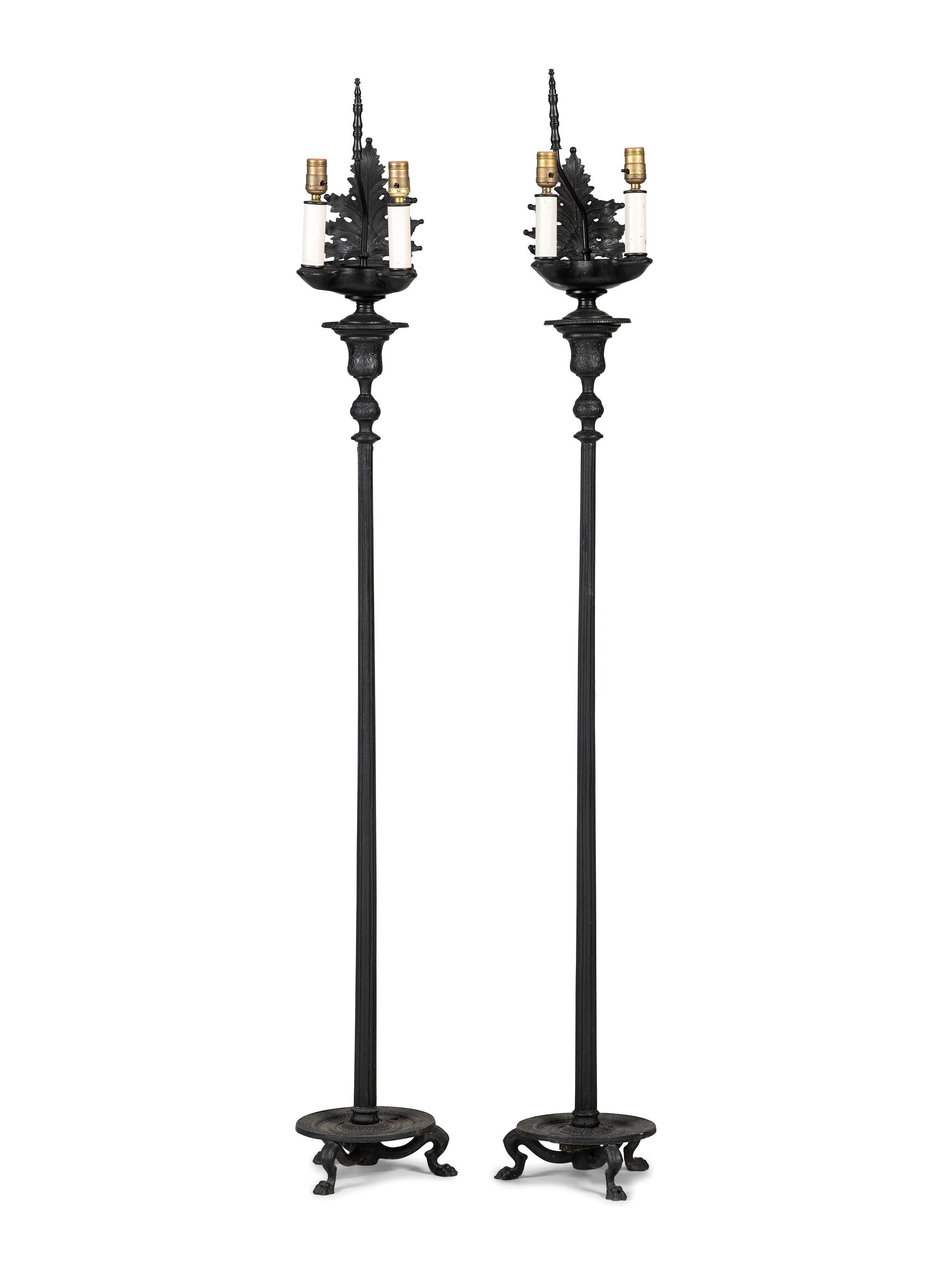 A Pair of Neoclassical Style Cast Metal Floor Lamps