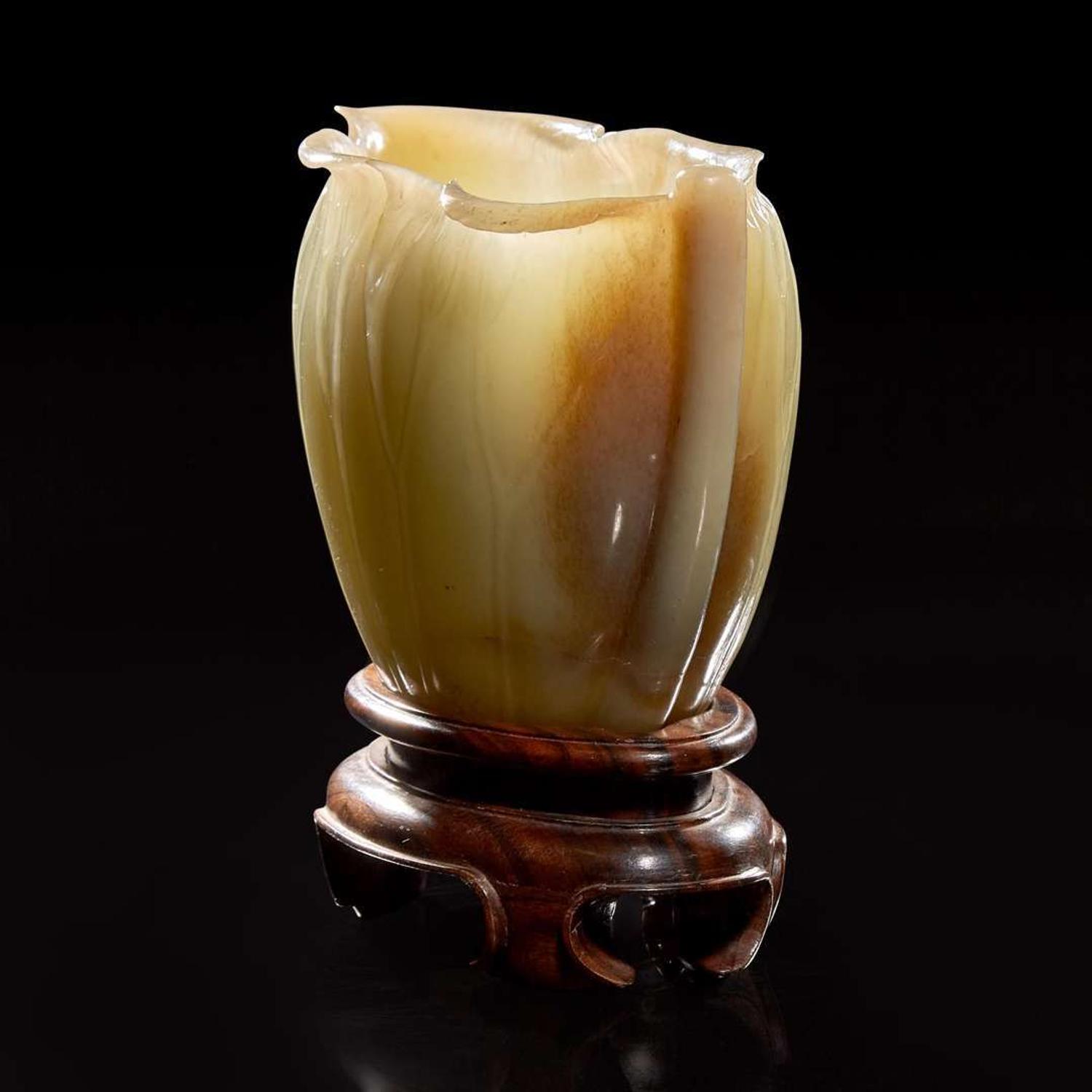 A Chinese carved celadon jade "Lotus" coupe 蓮葉玉杯