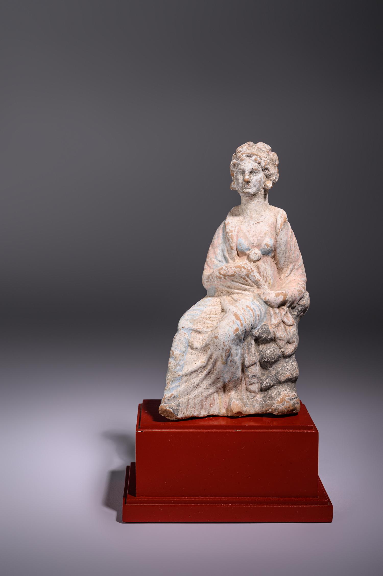 A Greek Terracotta Seated Woman