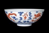 A Chinese Iron Red Decorated Underglaze Blue Porcelain 'Dragons' Bowl