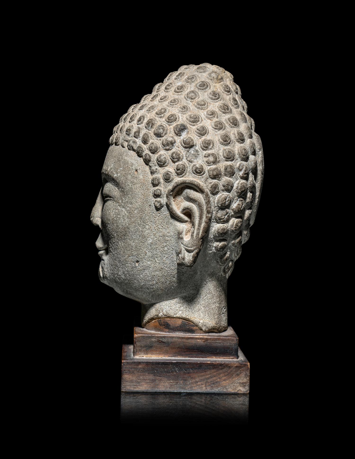 A Chinese Carved Stone Head of Buddha