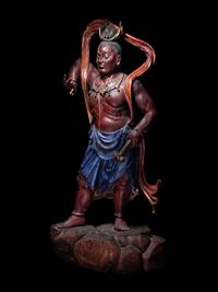 A Chinese Painted Wood Figure of a Guardian