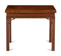 A George III Mahogany Blind Fret Carved Flip-Top Table